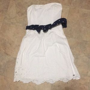 Strapless eyelet dress. Stretch back.